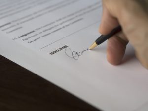 A cosigner or guarantor can help a borrower get credit by pledging to be responsible for the debt in the event that the primary borrower cannot repay it.